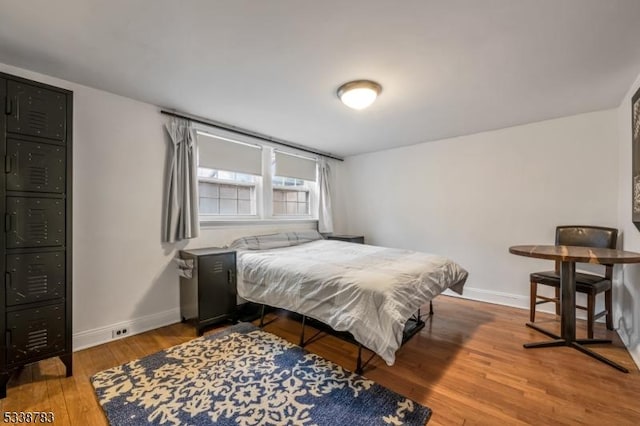 bedroom featuring hardwood / wood-style floors