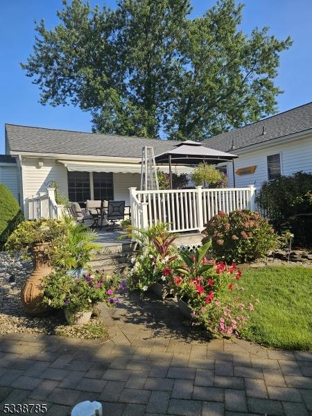 ranch-style house with a patio and a gazebo