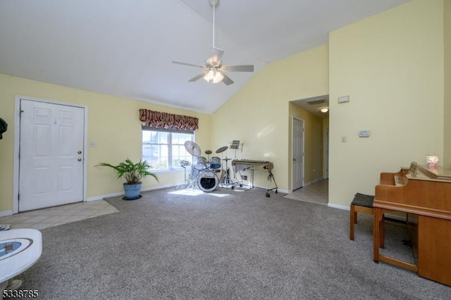 interior space with light carpet, high vaulted ceiling, and ceiling fan