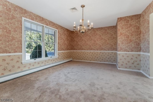 carpeted empty room featuring a notable chandelier, visible vents, a baseboard heating unit, baseboards, and wallpapered walls