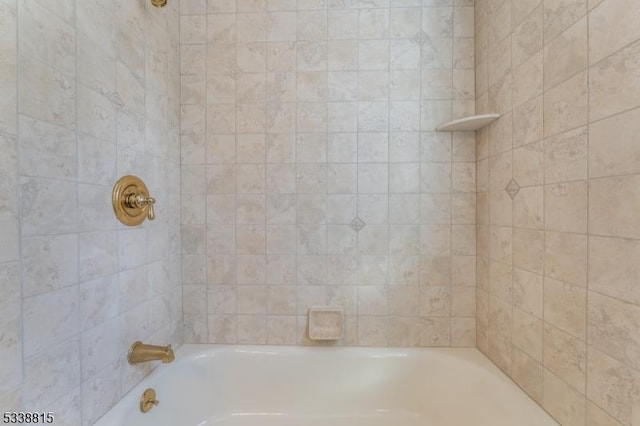 bathroom featuring bathing tub / shower combination