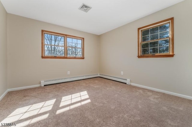 empty room featuring light carpet, baseboards, and visible vents