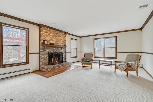 carpeted living room featuring baseboards, visible vents, baseboard heating, crown molding, and a brick fireplace