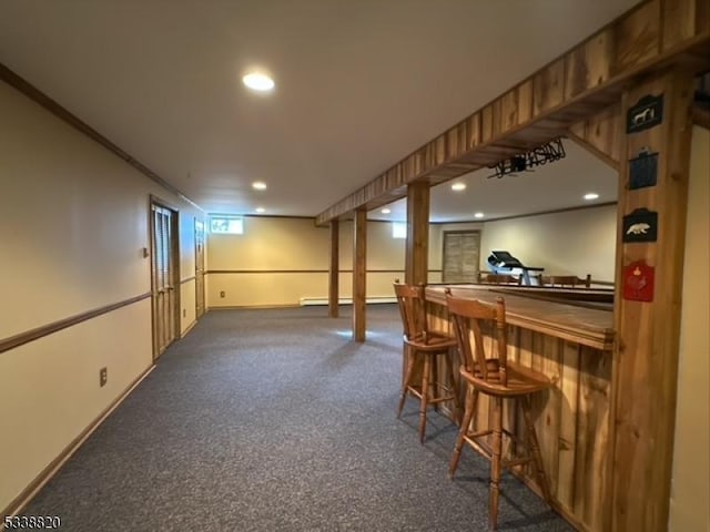 bar featuring recessed lighting, baseboards, dark carpet, and a dry bar