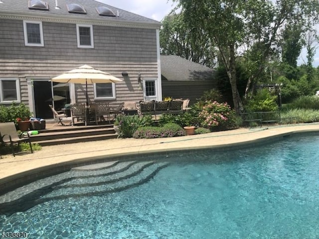 pool featuring a patio area