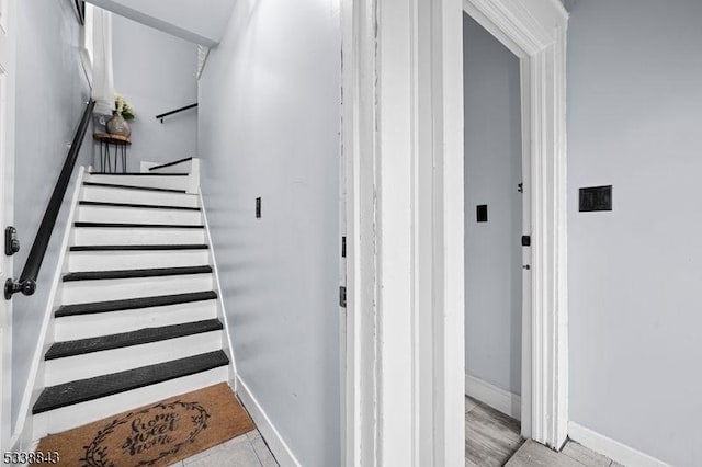 stairway with baseboards