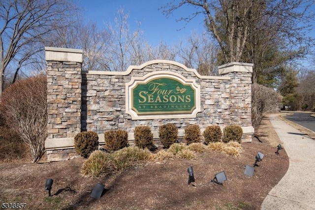 view of community sign