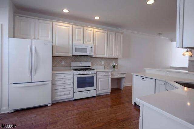 kitchen with white appliances, tasteful backsplash, dark wood-style flooring, light countertops, and recessed lighting