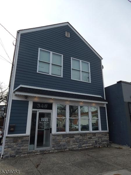 view of front of house featuring stone siding