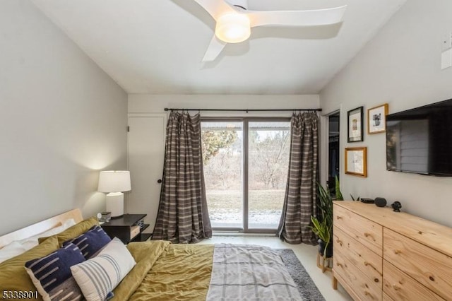 carpeted bedroom with access to exterior and ceiling fan