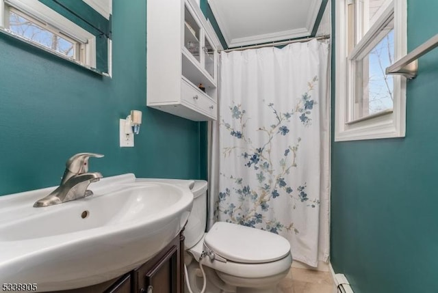 bathroom featuring tile patterned flooring, toilet, a shower with curtain, ornamental molding, and sink