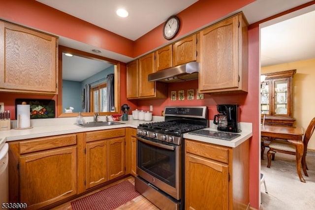 kitchen featuring sink and stainless steel gas range oven