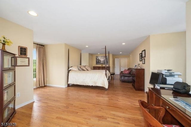 bedroom with baseboards, recessed lighting, and light wood-style floors