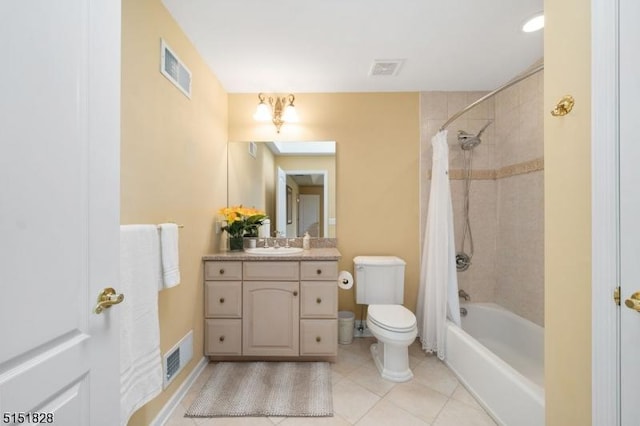 full bath with tile patterned flooring, visible vents, shower / tub combo, and toilet