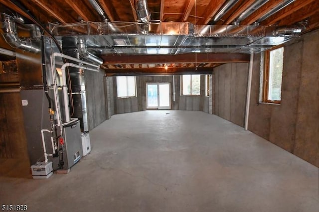 basement featuring heating unit