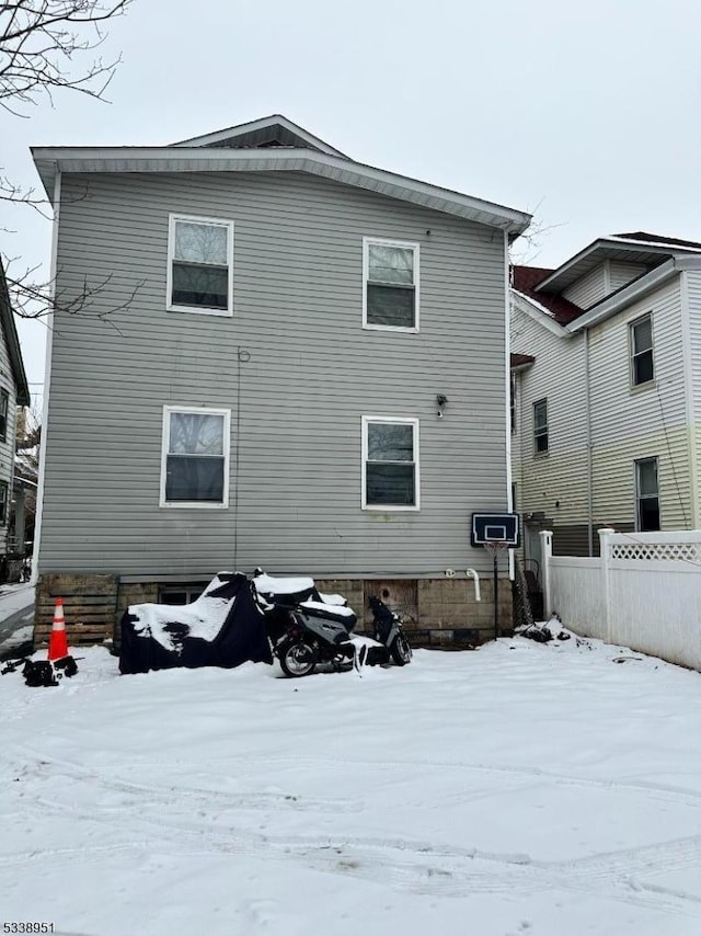 view of snow covered property