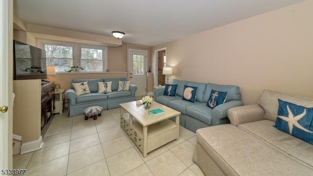 living room featuring light tile patterned floors