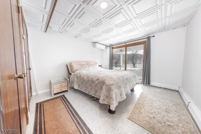 bedroom featuring an ornate ceiling, access to exterior, an AC wall unit, and baseboards