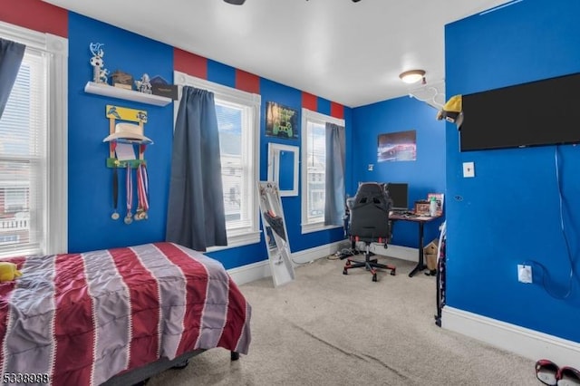 bedroom featuring carpet flooring and ceiling fan