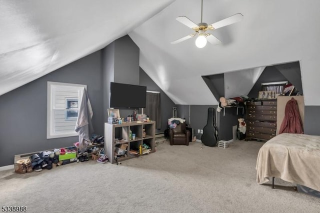 bedroom featuring lofted ceiling, ceiling fan, and light colored carpet