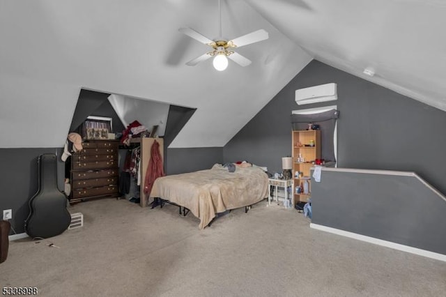 bedroom with an AC wall unit, vaulted ceiling, carpet flooring, and ceiling fan