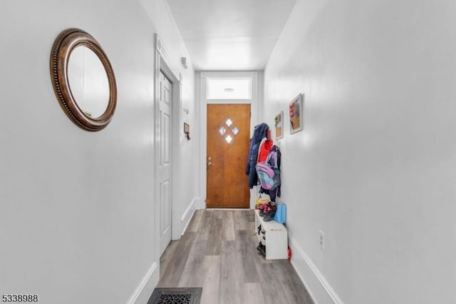 doorway to outside featuring light hardwood / wood-style flooring