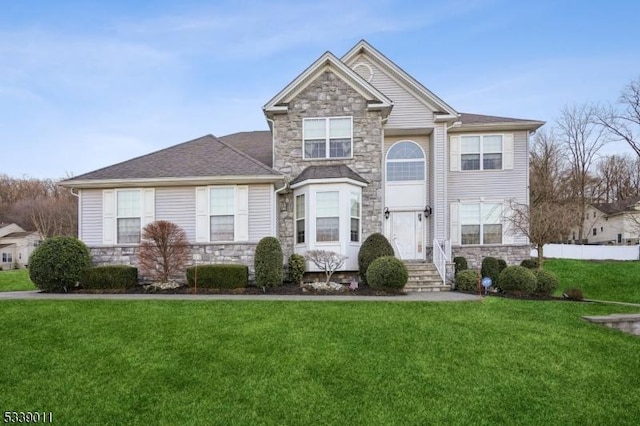 view of front property with a front lawn