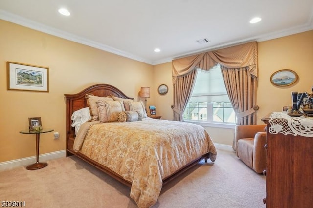 bedroom with crown molding and light colored carpet