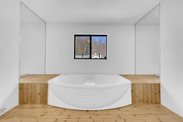 60 Overlook Dr, Independence Twp, NJ 07840 - bathroom featuring a bath and wood finished floors