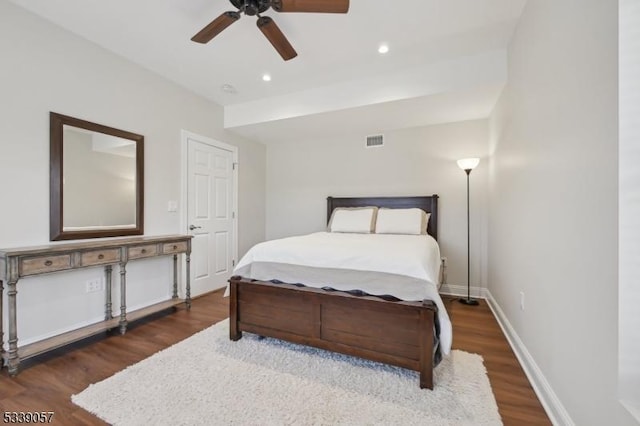 bedroom featuring recessed lighting, wood finished floors, a ceiling fan, visible vents, and baseboards