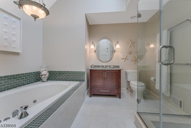 bathroom featuring a garden tub, visible vents, toilet, vanity, and tile patterned floors