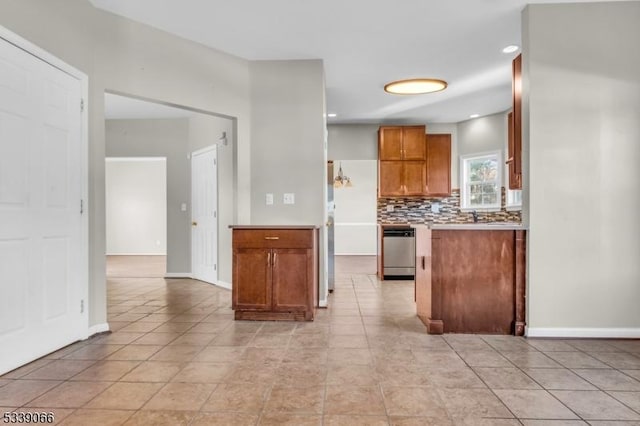 kitchen with backsplash, light tile patterned floors, and dishwasher