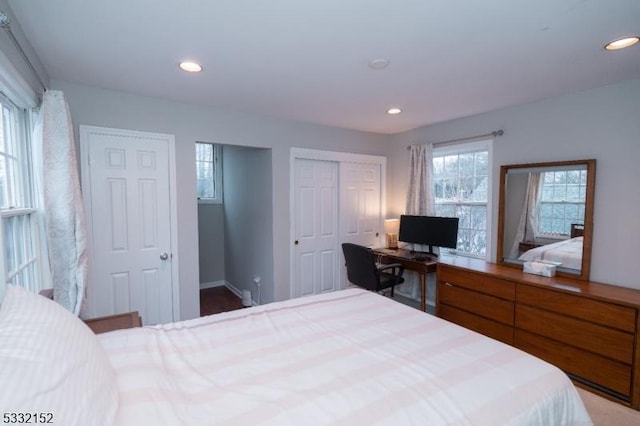 bedroom featuring recessed lighting, a closet, and baseboards