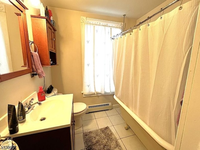 bathroom featuring a baseboard radiator, vanity, toilet, and tile patterned floors