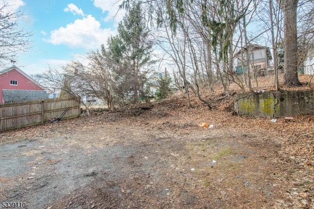 view of yard featuring fence