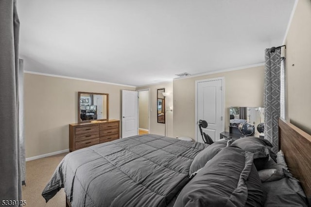 bedroom featuring crown molding and light colored carpet