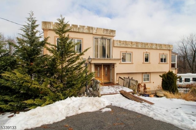 exterior space with stucco siding