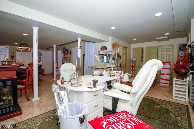 office area with recessed lighting, a fireplace, and decorative columns