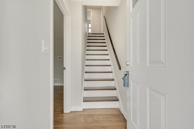 166 E Camplain Rd, Manville Boro, NJ 08835 - stairs with wood finished floors and baseboards