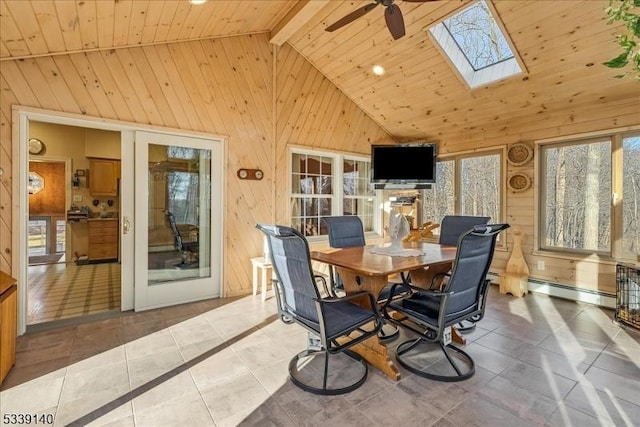 tiled dining area featuring beam ceiling, wooden walls, and high vaulted ceiling