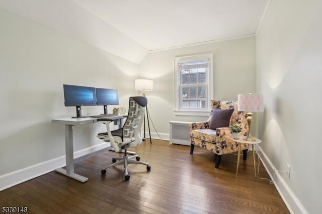 office with ornamental molding, lofted ceiling, baseboards, and hardwood / wood-style floors