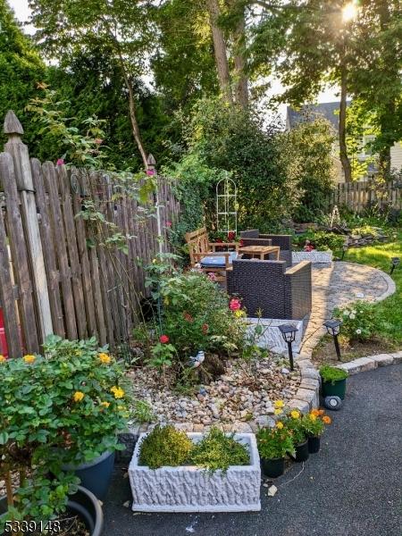 view of yard featuring a patio and fence