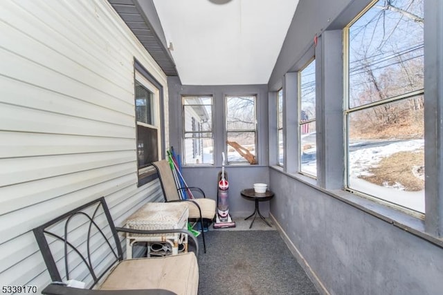 sunroom with lofted ceiling