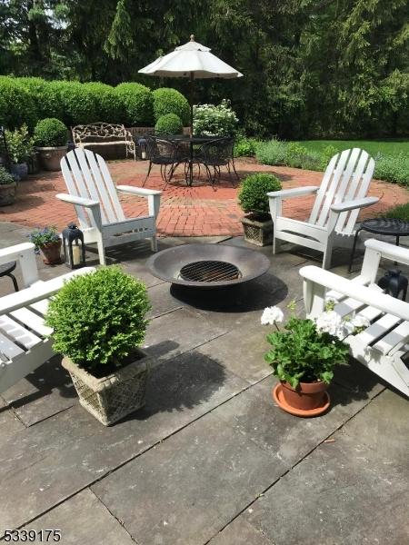 view of patio / terrace with a fire pit and outdoor dining space