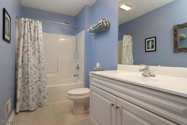 full bathroom featuring shower / tub combo with curtain, toilet, vanity, and tile patterned flooring