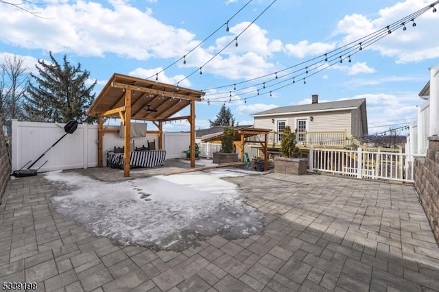 view of patio / terrace with fence private yard, a gate, and a gazebo