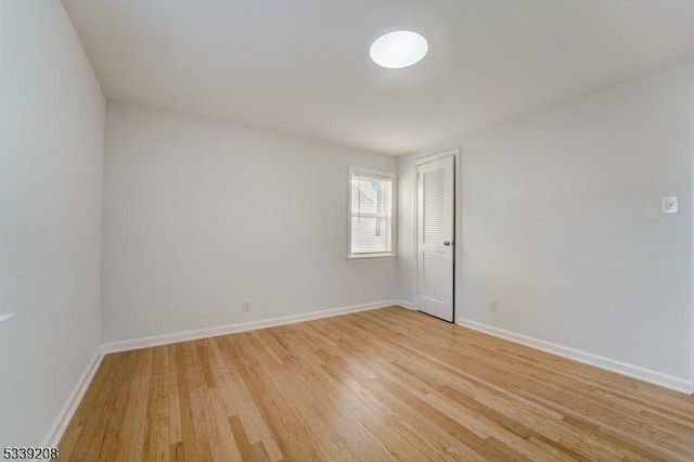 unfurnished room featuring light hardwood / wood-style flooring