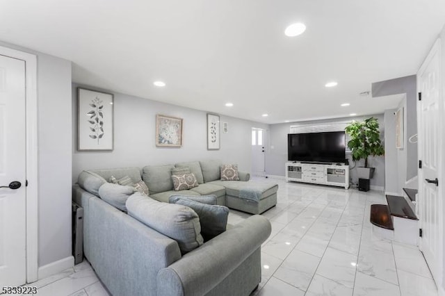 living room featuring baseboards, marble finish floor, and recessed lighting