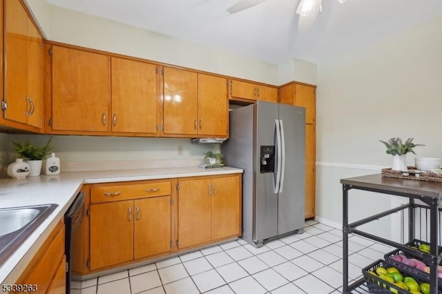 kitchen featuring brown cabinets, stainless steel refrigerator with ice dispenser, light countertops, a ceiling fan, and dishwasher