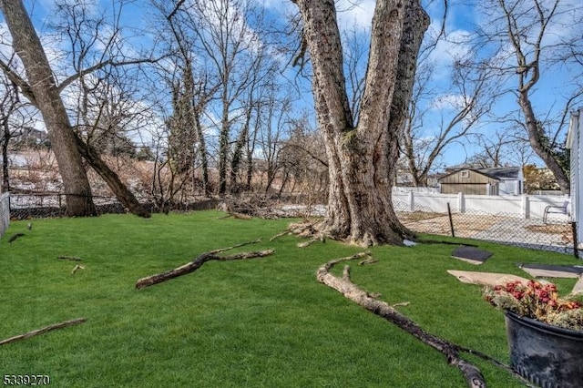 view of yard with fence